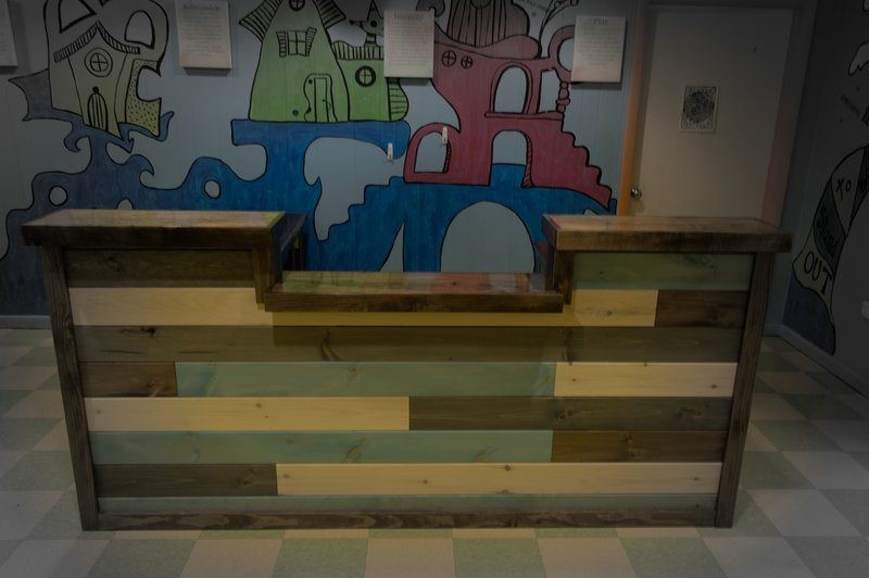 Custom Made Lobby Desk and Reception view from directly in front.