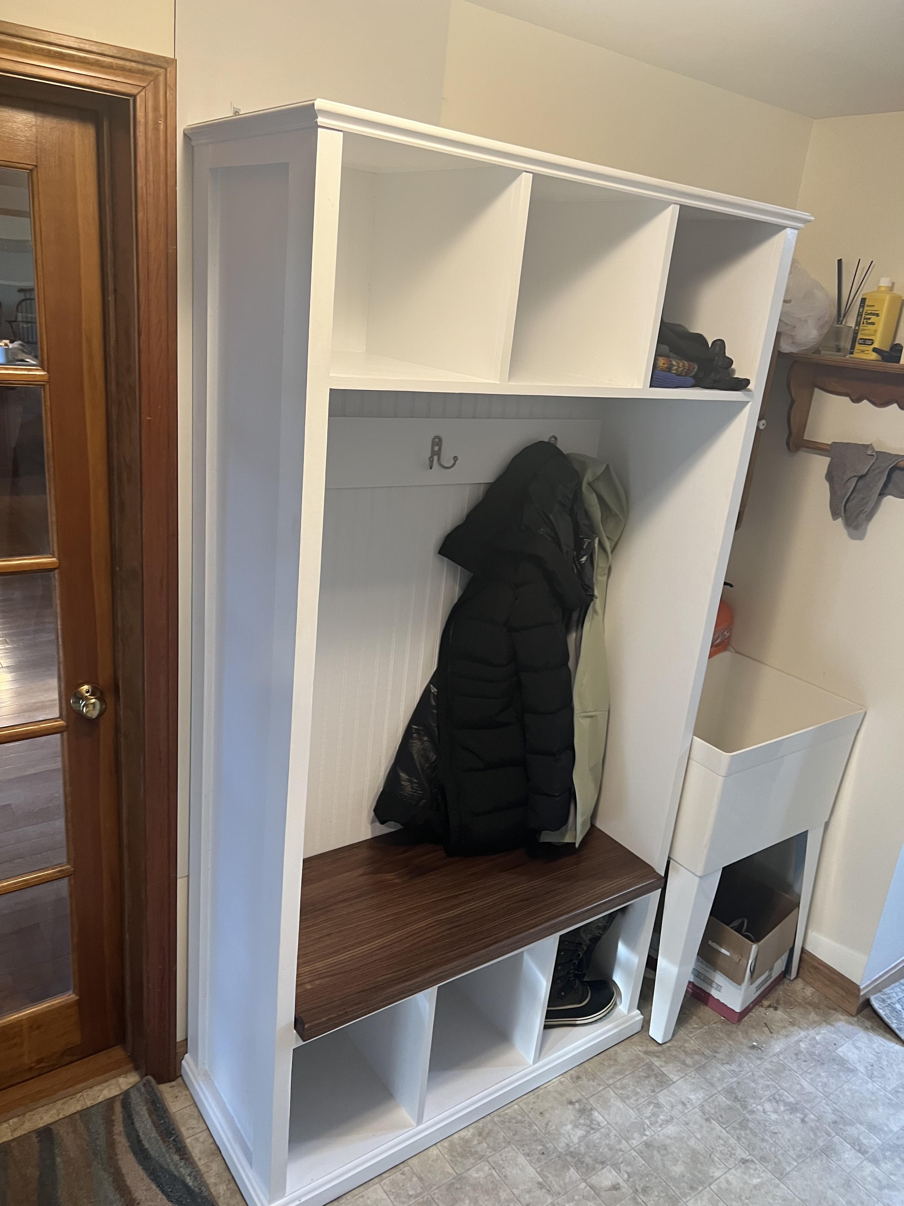 Gilmanton Hall Tree: A white cabinet with a bench and coat rack.